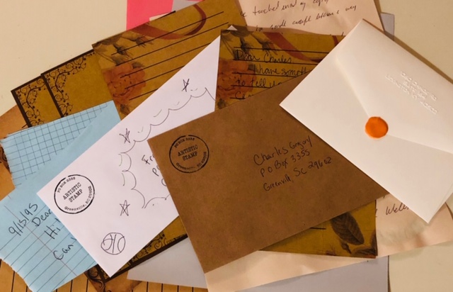 a small pile of assorted letters